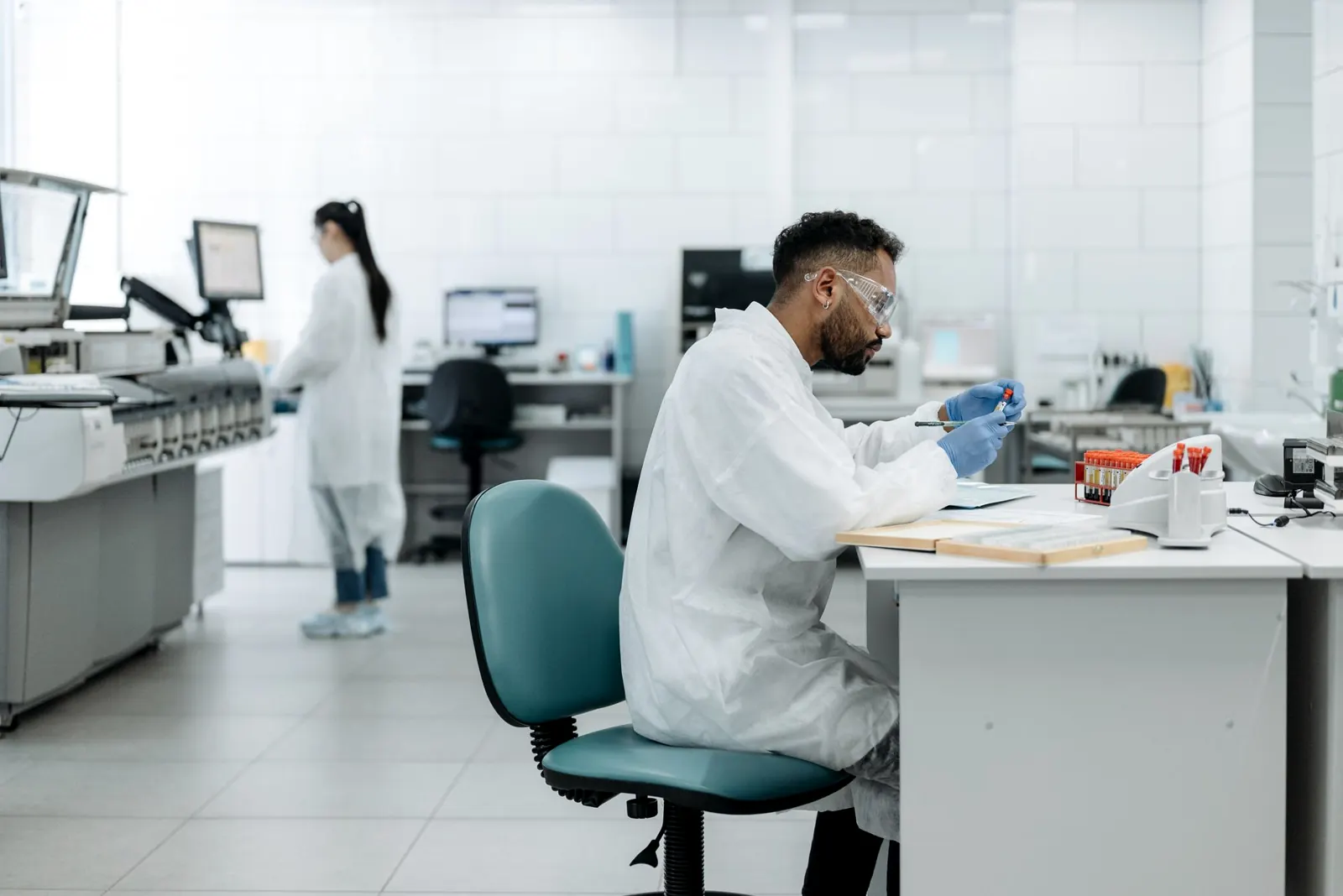 Scientist reviewing analytical data at a laboratory desk